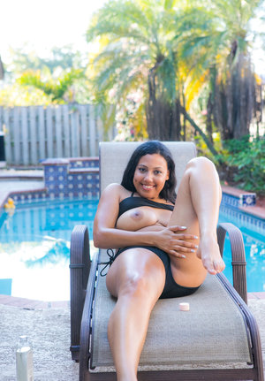 Amateur model Kirsty posing solo in white panties and socks